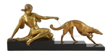 Armand Godard (1824-1887). A French Art Deco bronze group of a seated maiden with a borzoi upon a