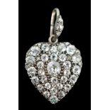 An early 20th century white gold and pave set diamond heart shaped pendant, overall 28mm, gross