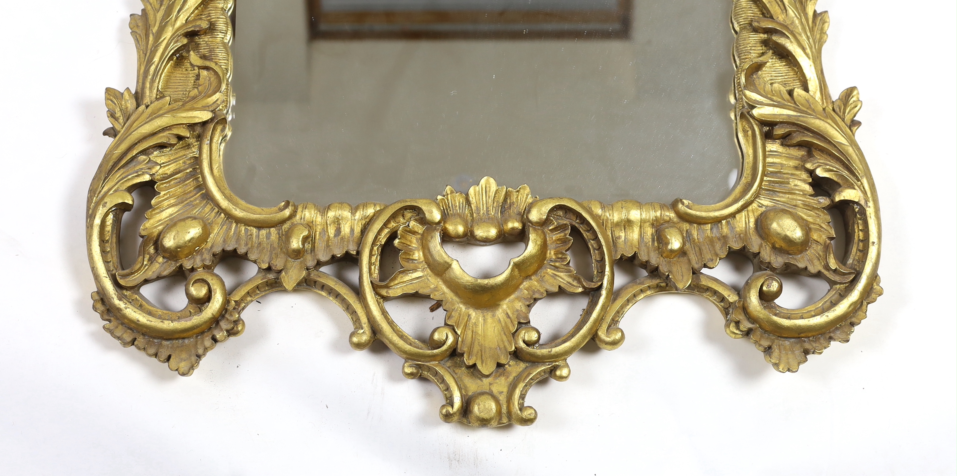 A 19th century Chippendale style carved giltwood wall mirror, with foliate scroll frame and - Image 2 of 4