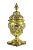 A George III silver gilt pedestal sugar vase and cover, by William Bateman?, with pineapple