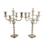 A good pair of George V silver four branch five light candelabra, by Elkington & Co., with waisted