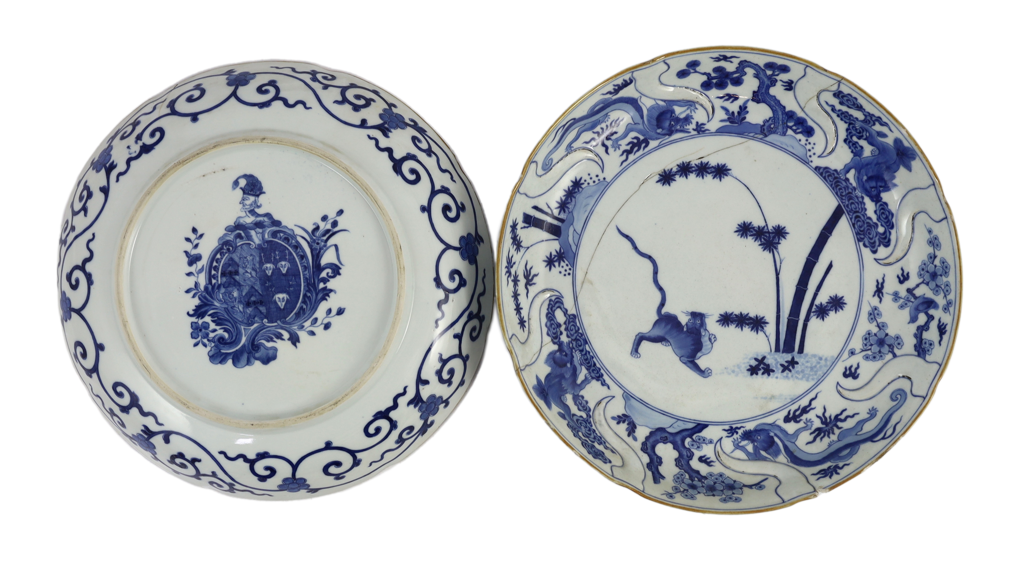 A pair of Chinese blue and white armorial dishes in Japanese Kakiemon style, Qianlong period, c.