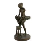 Sidney Beck (SA, b.1936). A limited edition bronze figure of a ballerina tying her shoe, signed in