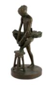 Sidney Beck (SA, b.1936). A limited edition bronze figure of a ballerina tying her shoe, signed in