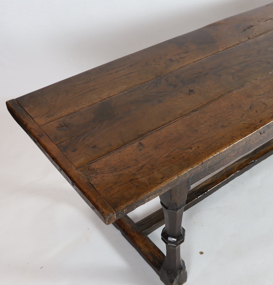 A Charles I oak refectory table, c.1630, the triple plank top with cleated ends, the four unusual - Image 3 of 4