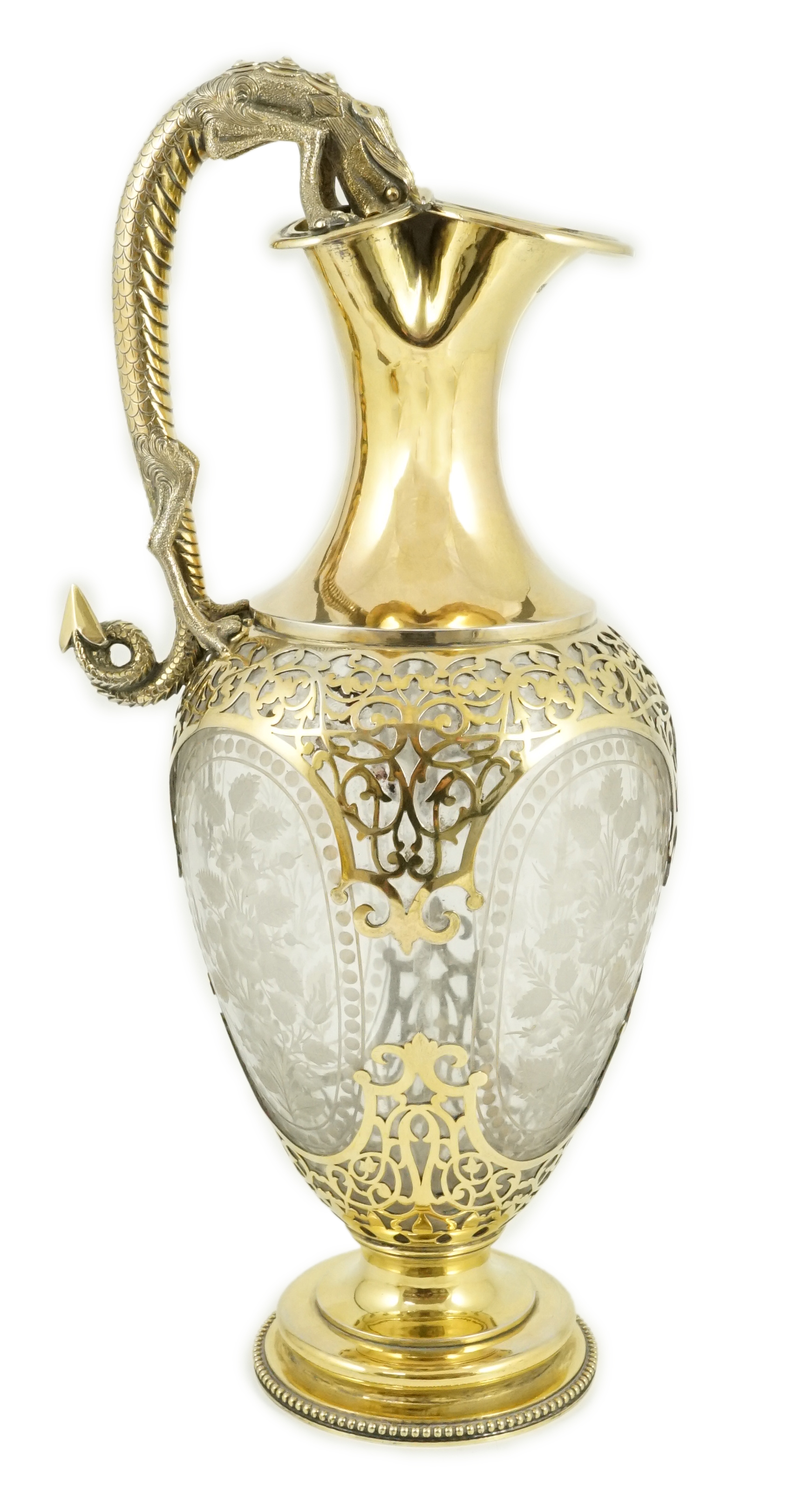 A good Victorian silver gilt mounted etched glass claret jug, by Goldsmiths Alliance, with grotesque