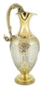 A good Victorian silver gilt mounted etched glass claret jug, by Goldsmiths Alliance, with grotesque