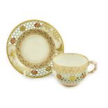 A Royal Worcester reticulated miniature cabinet cup and saucer, late 19th century, each piece