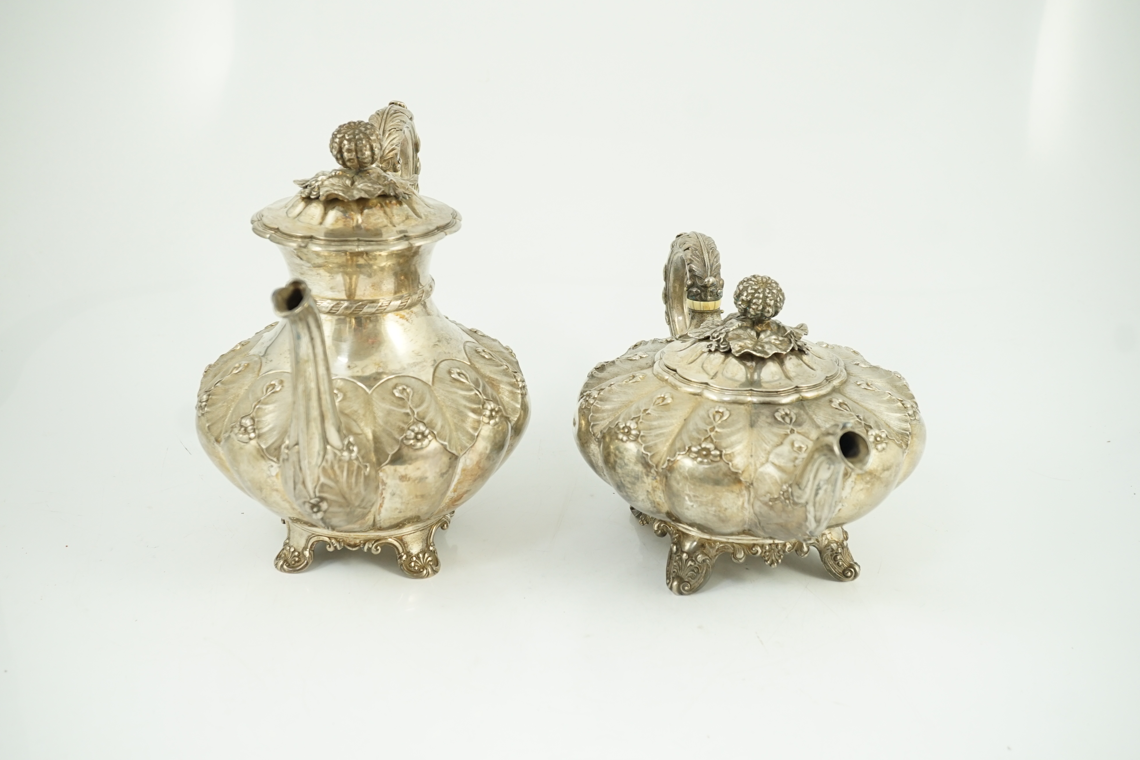 A George IV silver melon shaped coffee pot and matching tea pot by The Barnards, with thistle leaf - Image 5 of 7