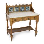 Lewis Foreman Day (1845-1910). A Victorian Aesthetic movement golden oak and marble washstand, inset