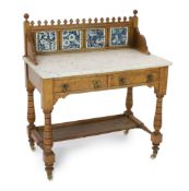 Lewis Foreman Day (1845-1910). A Victorian Aesthetic movement golden oak and marble washstand, inset