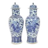 A pair of large Chinese blue and white ‘Buddhist lion’ vases and covers, 19th century, each