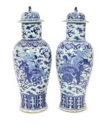 A pair of large Chinese blue and white ‘Buddhist lion’ vases and covers, 19th century, each
