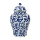 A massive Chinese blue and white jar and cover, Kangxi period, painted with alternating landscape