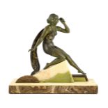 A French Art Deco bronzed spelter and marble figure of a bathing beauty, kneeling with a seashell