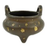 A large Chinese gold-splashed bronze tripod censer, ding, Kangxi period, the gold-splashed