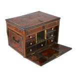 An early 18th century Indo Portuguese ebony, satinwood and red tortoiseshell travelling case, the