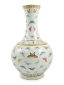 A Chinese famille rose ‘butterfly’ vase, Guangxu mark, finely painted with scattered butterflies,