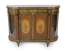 A late 19th century French Louis XVI style inlaid mahogany and ormolu mounted credenza, of