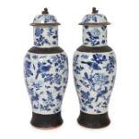 A pair of large Chinese blue and white crackle glaze vases and covers, late 19th century, each