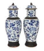 A pair of large Chinese blue and white crackle glaze vases and covers, late 19th century, each