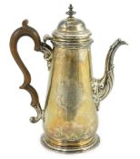 A George II silver coffee pot, by Thomas Whipham, of tapering form, with engraved armorial,