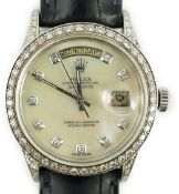 A gentleman's 1980's 18k white gold Rolex Oyster Perpetual Day Date wrist watch, with after market