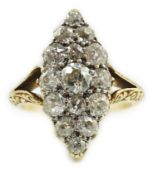 An early to mid 20th century 18ct gold and fifteen stone diamond cluster set marquise shaped ring,