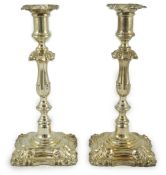 A pair of Victorian silver mounted candlesticks, by Frederick Elkington, with knopped waisted