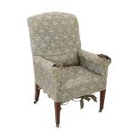 A late Victorian Howard & Sons armchair, upholstered in the original Howard & Sons floral scroll