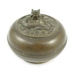 A Chinese bronze 'dragon' circular incense box and cover, Xuande seal mark, 18th/19th century, the