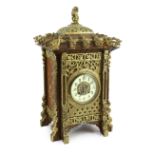 A late 19th century French ormolu mounted mahogany and shibayama style mantel clock, in the Japanese