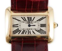 A gentleman's modern 18ct gold Cartier Tank Divan quartz wrist watch, on Cartier leather strap