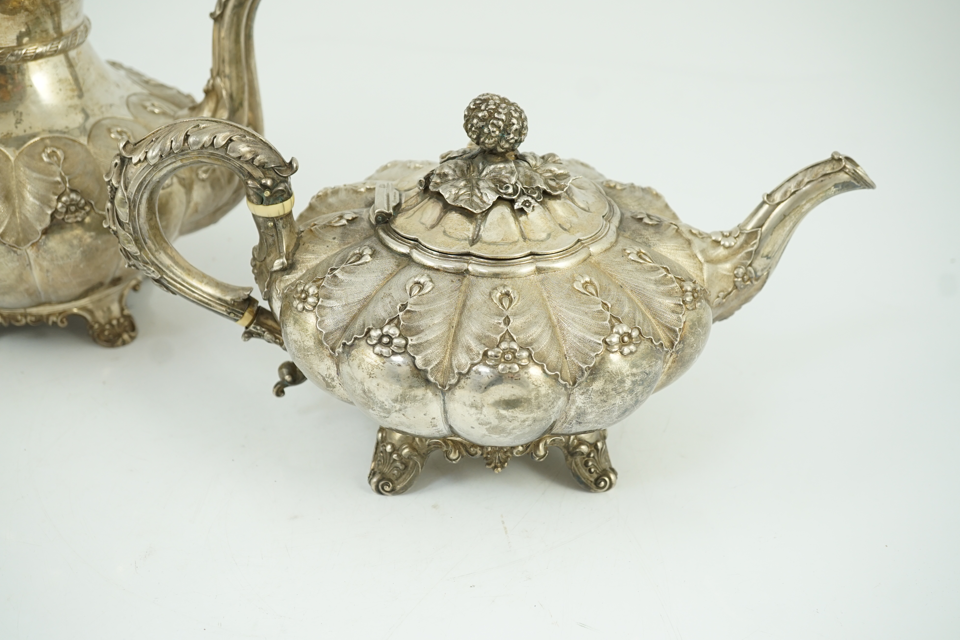 A George IV silver melon shaped coffee pot and matching tea pot by The Barnards, with thistle leaf - Image 2 of 7