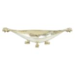 A George V Arts & Crafts planished silver boat shaped dish, by Omar Ramsden, with fluted