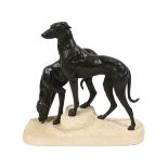 Jules Edmund Masson (French, 1871-1932). A French Art Deco bronze group of two hounds,