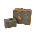 A 1940's Goyard vanity case with matching suitcase, each with tan leather mounts, the vanity case