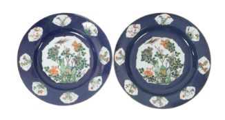 A near pair of Samson famille verte powder blue dishes in Chinese export style, each painted with