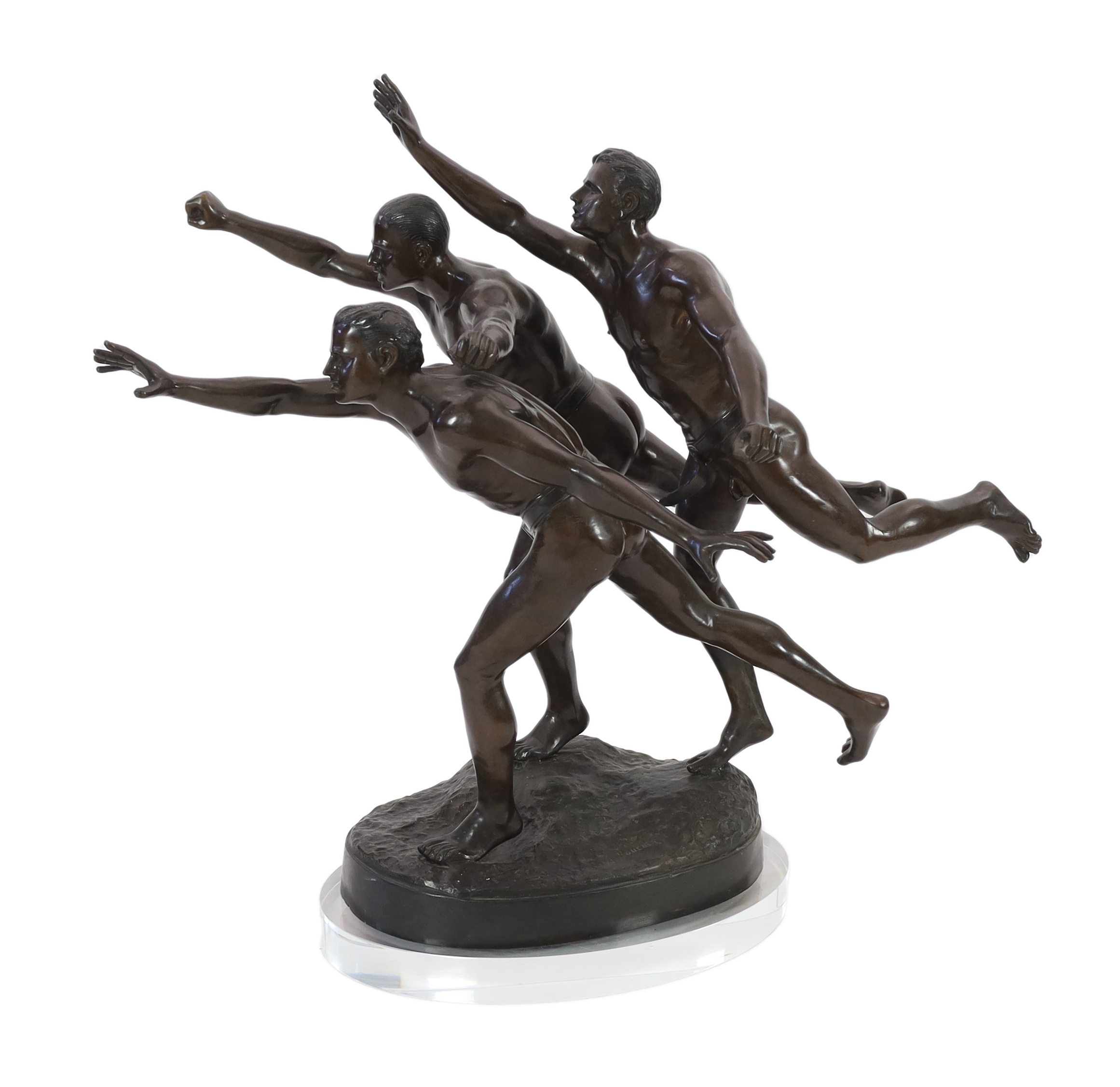 After Alfred Boucher (French, 1850-1934). A large bronze group of three runners at the finishing