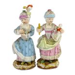 Two Meissen figures of a girl holding a doll and another with a toy sheep, 19th century, each