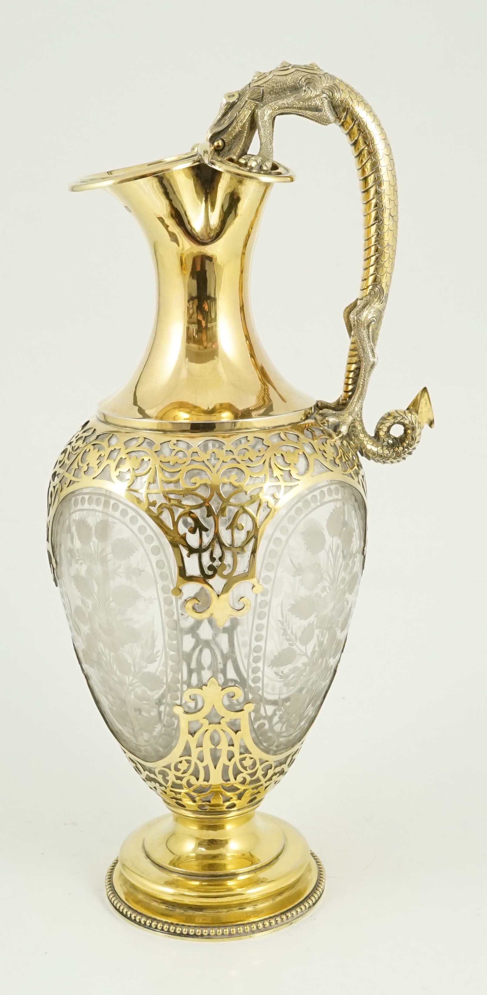 A good Victorian silver gilt mounted etched glass claret jug, by Goldsmiths Alliance, with grotesque - Image 3 of 6