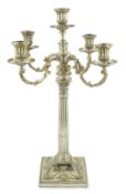 A good Victorian silver four branch, five light candelabrum, by R & S Garrard & Co, with