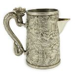 A Chinese embossed white metal mug, now converted to a jug, maker possibly LC or LO, with dragon