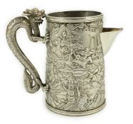 A Chinese embossed white metal mug, now converted to a jug, maker possibly LC or LO, with dragon