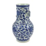 A Chinese blue and white ‘lotus’ vase, first half 19th century, the cylindrical neck modelled in