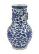 A Chinese blue and white ‘lotus’ vase, first half 19th century, the cylindrical neck modelled in