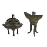 A Chinese bronze and copper alloy tripod censer and cover and a Chinese archaistic bronze tripod