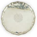 A George III silver salver, by John Crouch I and Thomas Hannam, of shaped circular form, with beaded