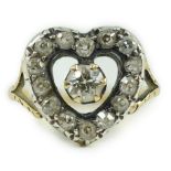 An antique gold and diamond set heart shaped open work cluster ring, size K, gross weight 4