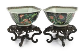 A pair of Chinese famille noire square bowls, late 19th century, painted to each side with panels of